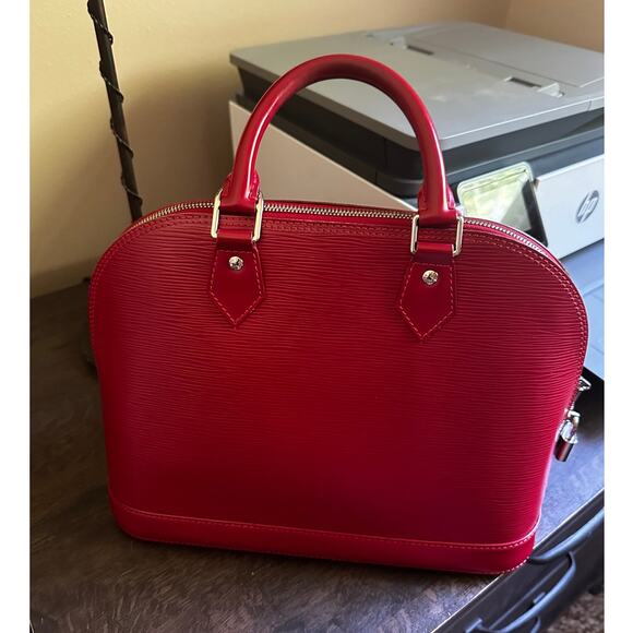 LOUIS VUITTON FUCHSIA RED ALMA WITH SILVER HARDWARE; LOCK & KEYS AND CLOCHETTE - Picture 2 of 14